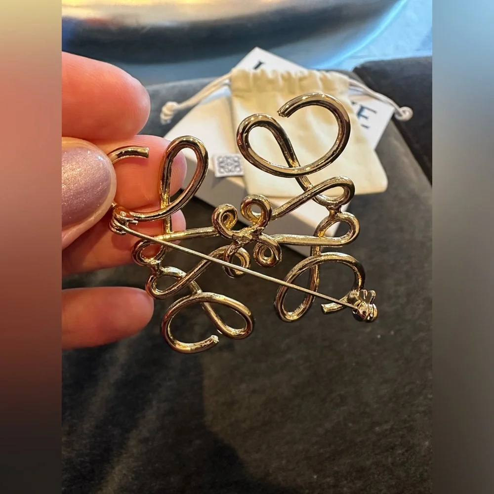 Loewe Gold Signature Anagram pin  Reposhed from a reputable posher . Never worn